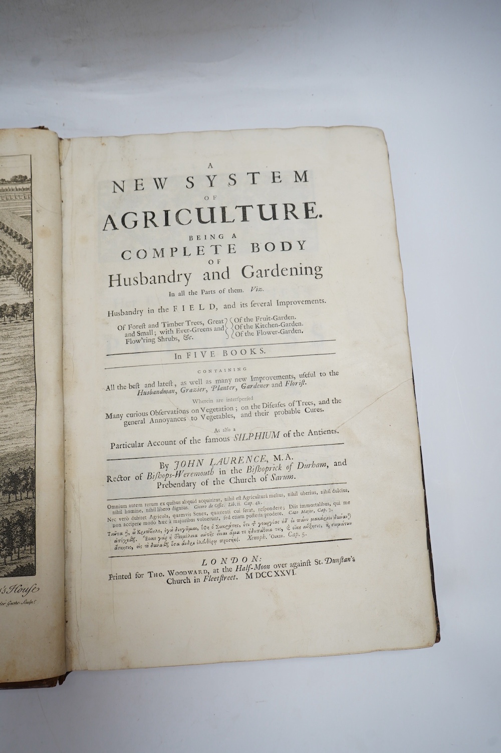 Laurence, John - A New System of Agriculture. Being a complete body of husbandry and gardening....1st edition. frontis. 2 plates, engraved text illus., head and tailpiece decorations; contemp. blind decorated panelled ca
